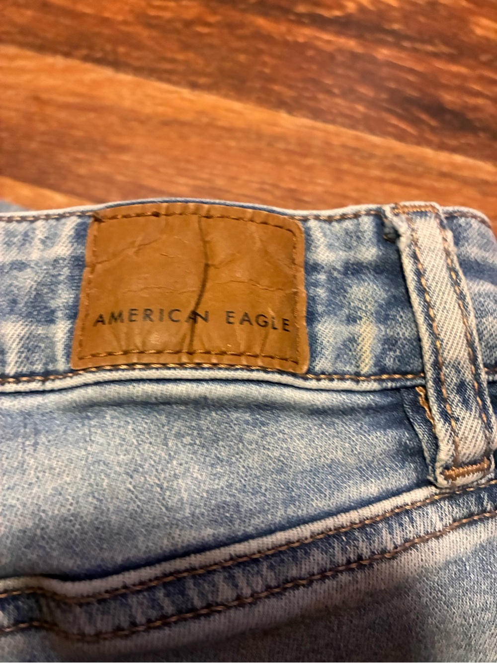 American Eagle Outfitters Light Blue Denim Jeans with Leather Patch